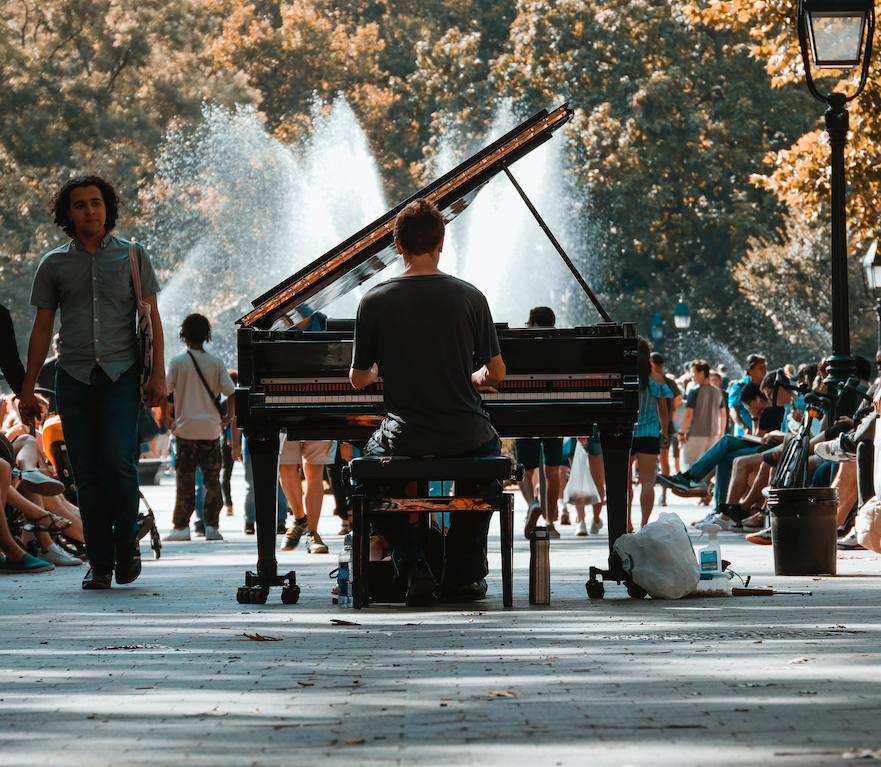 Musician playing piano in New York City park